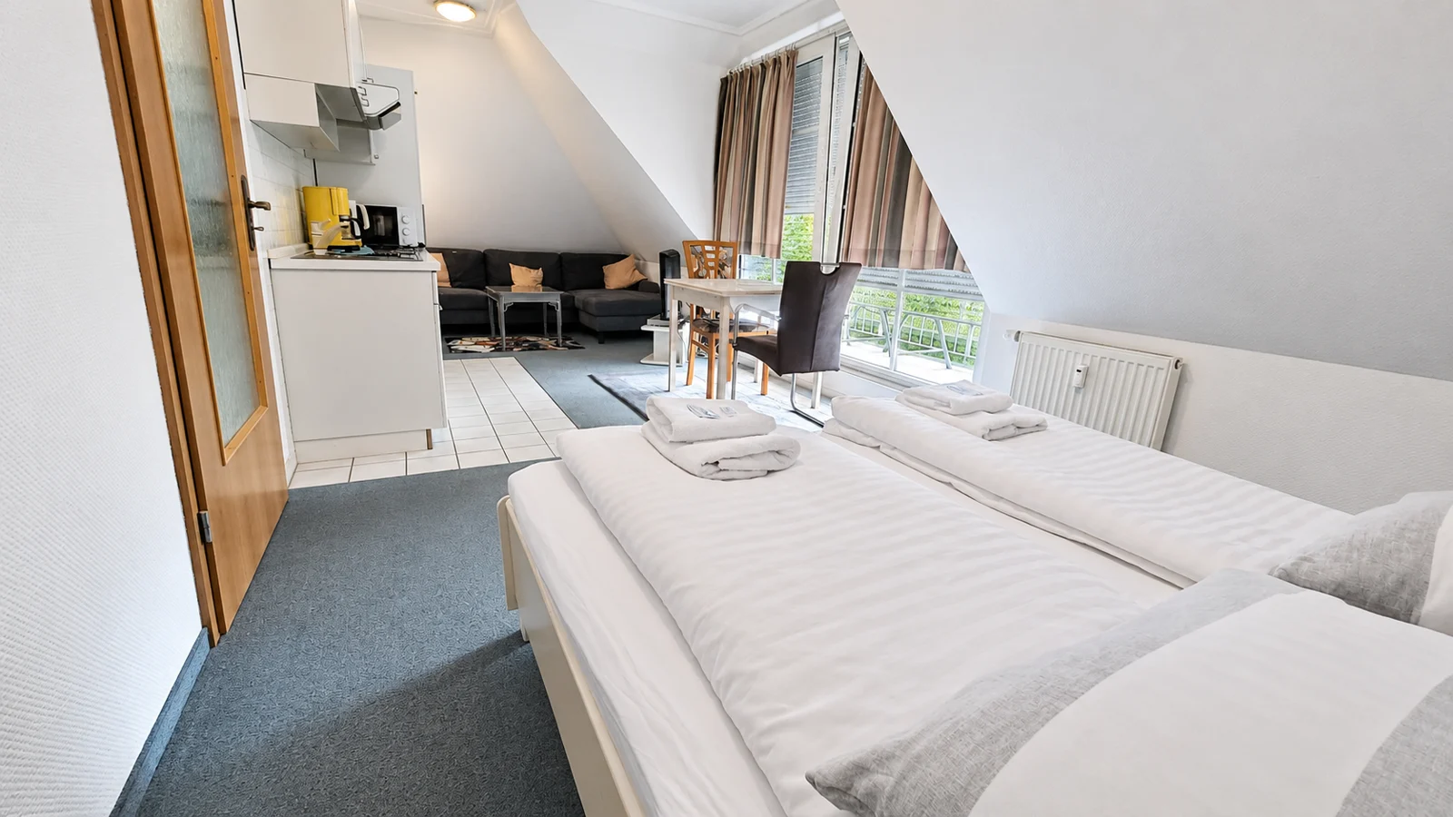 Apartamento Duhnen · zona de estar y dormitorio